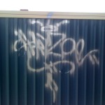 graffiti removal from corrugated iron